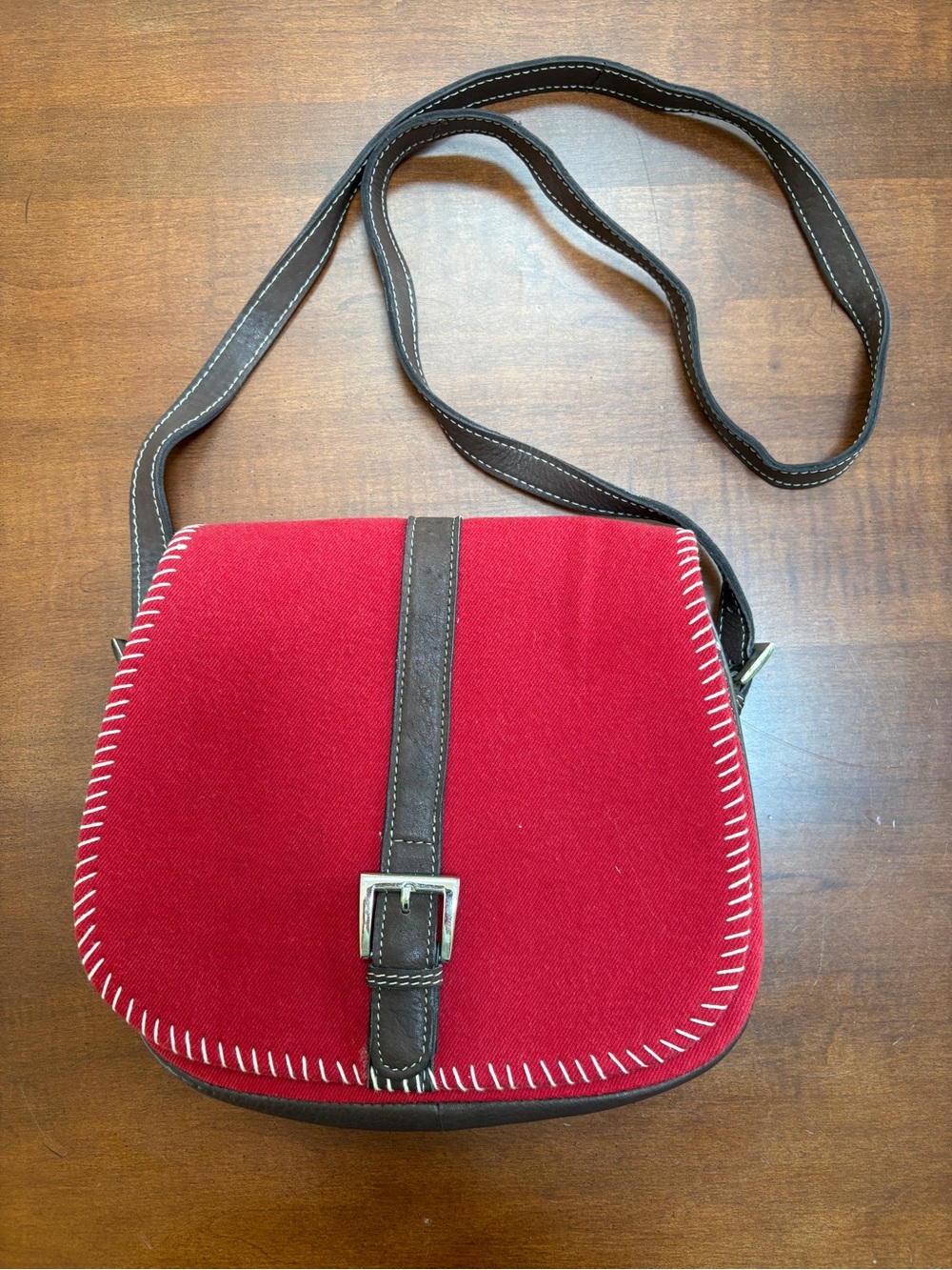 Red Crossbody Saddle Bag with Brown Trim